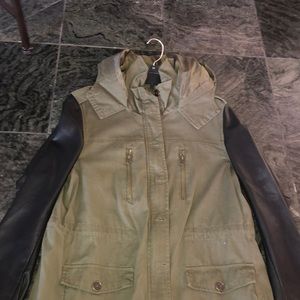 Green and black sleeved leather jacket